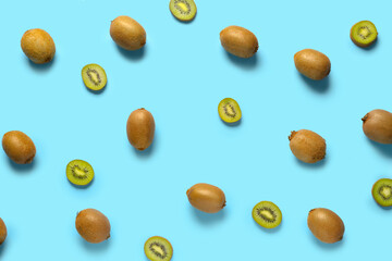 Many ripe kiwi on color background