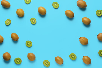Frame made of ripe kiwi on color background