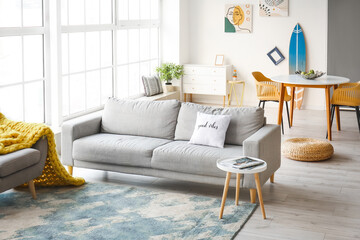 Interior of modern room with surfboard