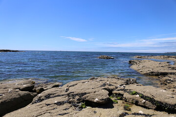 Fototapeta na wymiar Bay de concarneau, France, Brittany, June 2021, beach and rocks