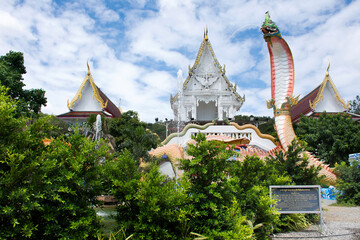 Naka statue of Wat Khao Sung Chaem Fa temple on Khao Sam Sip Hap mountain for thai people and...