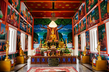 Buddha statue of Wat Khao Sung Chaem Fa temple on Khao Sam Sip Hap mountain for thai people and...