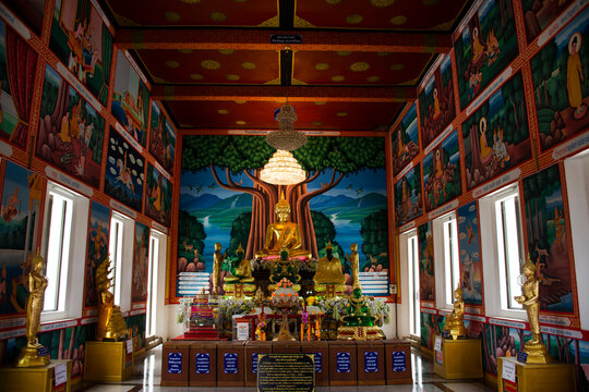 Buddha statue of Wat Khao Sung Chaem Fa temple on Khao Sam Sip Hap mountain for thai people and foreign travelers travel visit and respect praying at Tha Maka on May 23, 2021 in Kanchanaburi, Thailand