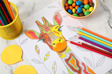 Coloring picture, sweets and pencils on light background, closeup