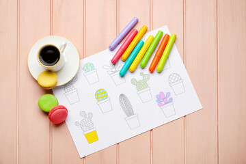 Composition with coloring picture on color wooden table