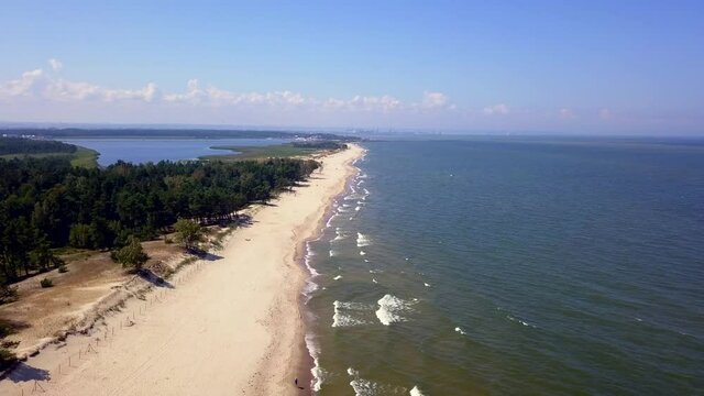 4k AERIAL with sandy beach of Baltic Sea in Poland.
