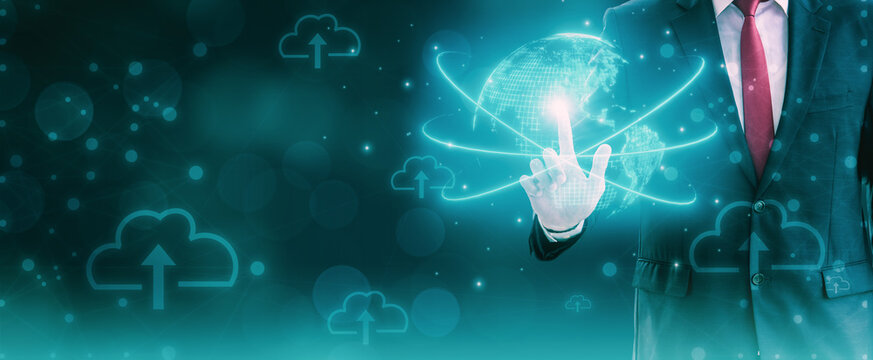 Businessman using finger touch planet earth hologram display,connect data control cloud computing,cloud strong computing 5G network,technology management big data,customer service data center