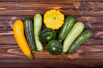 Directly above shot of vegetables. Health vegan and vegetarian food concept. Raw vegetables on a wooden background. Composition. Organic vegetables. Flat lay view of colourful raw vegan food.
