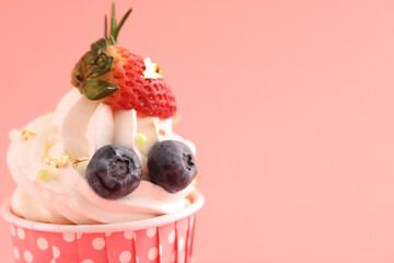 Fruits cupcake isolated in pink background