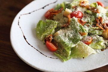 caesar salad appetizer on wooden background
