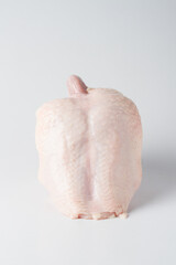 Fototapeta premium raw chicken breast with skin, white background