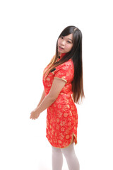 beauty woman wear red cheongsam looking and smile in chinese new year