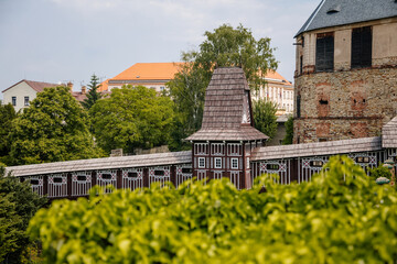 Wonderful covered wooden bridge by Dusan Jurkovic in Italian garden, baroque park in sunny summer...