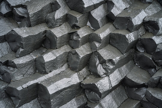 Close Up Of Basalt Columns On Black Sand Beach. Iceland