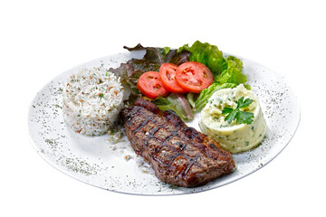 Beef steak with potatoes and rice in isolated white background