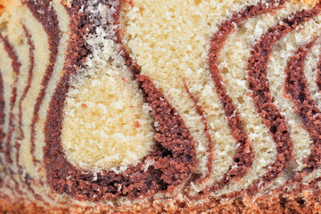 Chocolate Marble Cake, Tiger or zebra cake as a background. Delicious and easy to make cake.