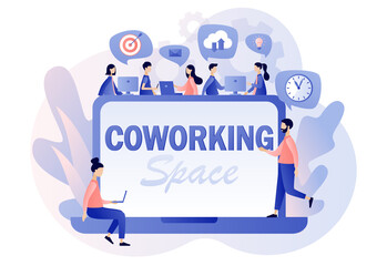 Co-working space - text on laptop screen. Tiny people working on computers, smartphones on shared modern office workplace. Shared working environment. Modern flat cartoon style. Vector illustration