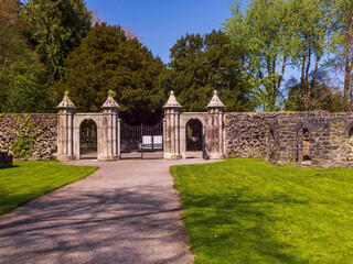 Fototapeta na wymiar Decorated entrance gate to the gardens