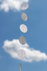 silvery circles as a decoration against the sky