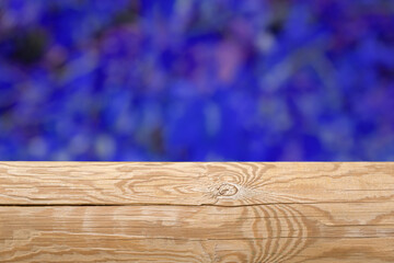 Natural wood trunk with strong blue background