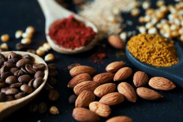spoons filled with spices and grains