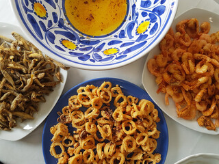 Ready recipe. Fried fish, squid and sardines
