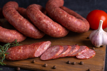 Sliced slices of homemade sausage. Homemade Krakow sausage