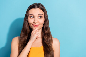 Fototapeta premium Photo portrait girl thoughtful curious looking copyspace isolated pastel blue color background