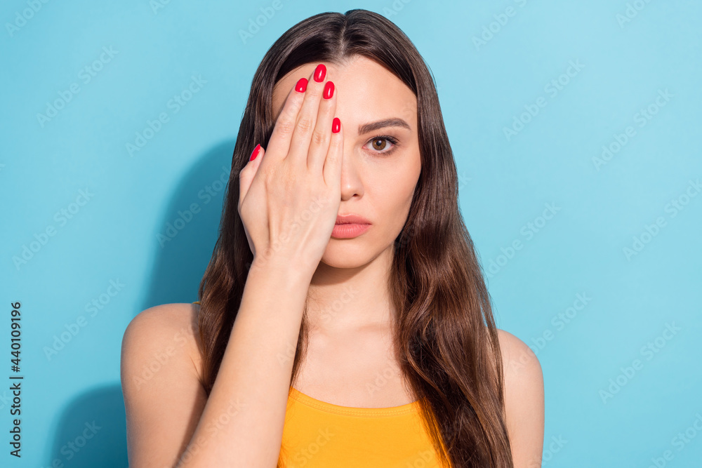 Sticker photo portrait girl covering eye with hand checking eyesight isolated pastel blue color background c