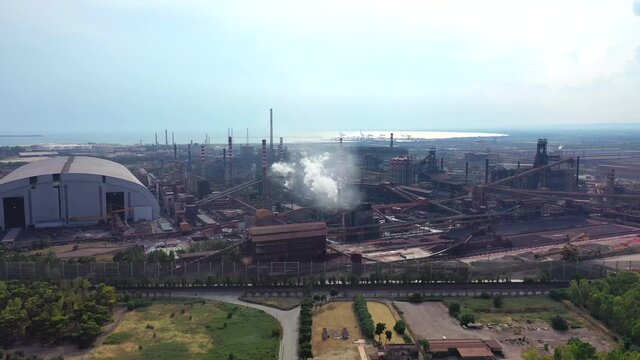 The industrial area of ​​Taranto.
Aerial view of the smokestacks of the polluting industries