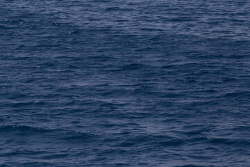 view on dark blue waves in sea