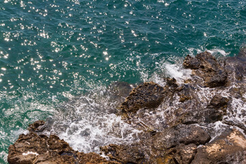 view on sunshine in aqua waves of sea in Antalya