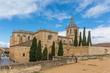 Majestic front view at the iconic spanish Romanesque architecture building at the Cuidad Rodrigo cathedral, towers and domes, downtown city