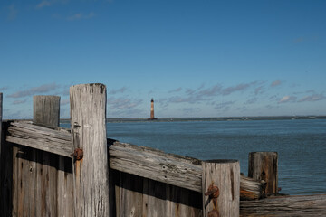 Fototapeta na wymiar THe decommissined Morris Island Lighthouse at the entrance to Charleston Harbor in South Carolina
