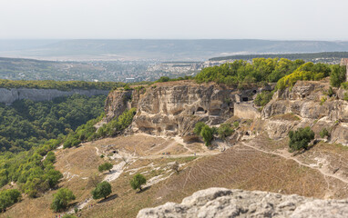 Fototapeta na wymiar Panorama of the ancient city carved in the rock in the Republic of Crimea . Beautiful view of the entire valley .