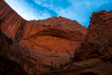 Beautiful double arch in the Kolob canyon. Dark red color