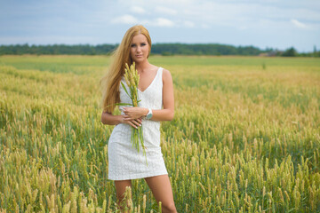 portrait of a beautiful woman in the field