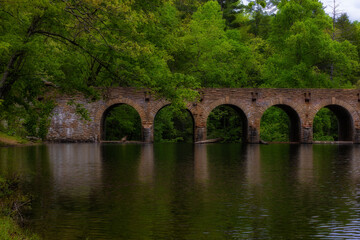 Fototapeta na wymiar Bridge and dam at Cumberland Mountain State Park in Tennessee