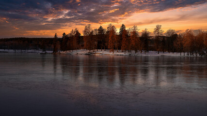 Ice and fire. The sky is in fire and the lake is frozen. From Norway, Bogstadvannet.
