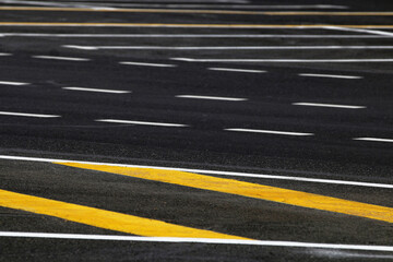 Road signs painted on the asphalt ground