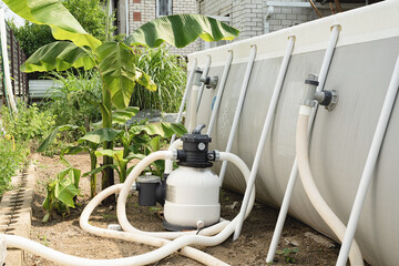 Sand filter plant at a pool in the backyard