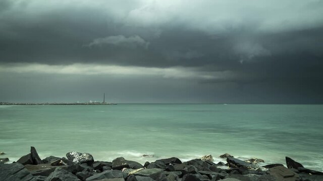 Storm clouds over a fishing port in bay of bengal near Tranquebar, Chennai, Tamil Nadu