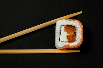 sushi on a black plate, japanese sushi food