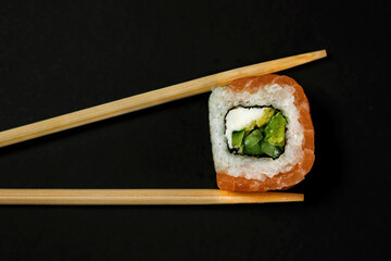 sushi on a black plate, japanese sushi food