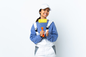 Painter woman over isolated white background applauding after presentation in a conference