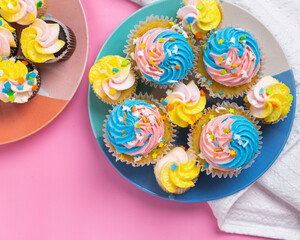 Bright and colorful birthday cupcakes with sprinkles