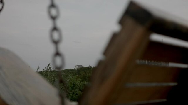 montauk point lighthouse close on swinging chair.
