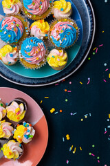 Bright and colorful birthday cupcakes with sprinkles