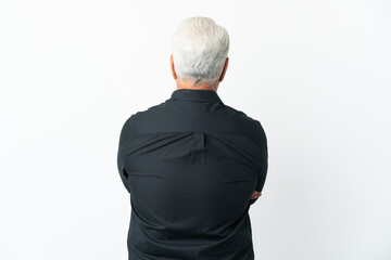 Middle age Brazilian man isolated on white background in back position