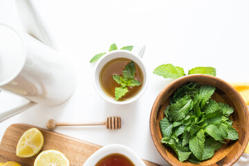 Mint tea with fresh mint leaves, lemon, and honey